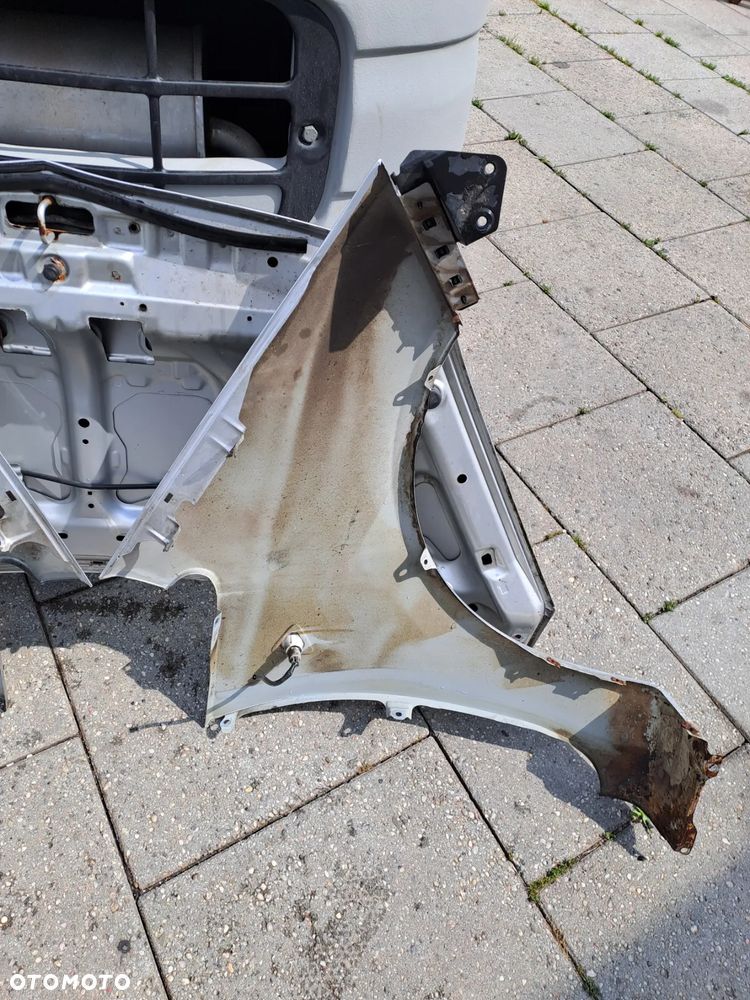 Mitsubishi Colt Z30 VI błotniki kod lakieru 21H - 29