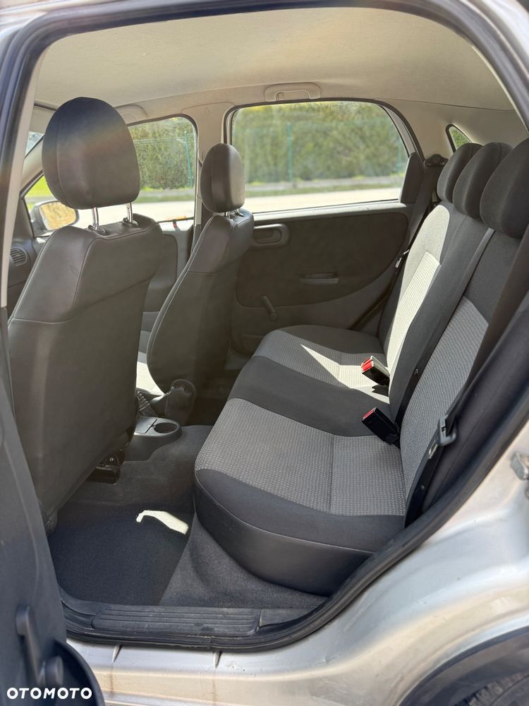 Opel Corsa 1.0 12V Cosmo - 8