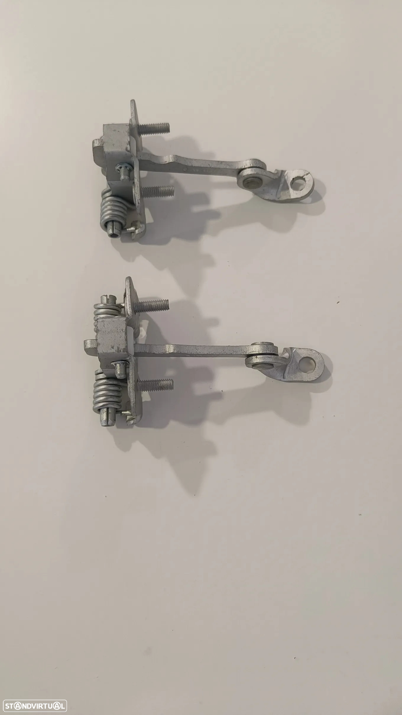 Limitador esticador dobradiça porta Peugeot 206 (novo) - 2