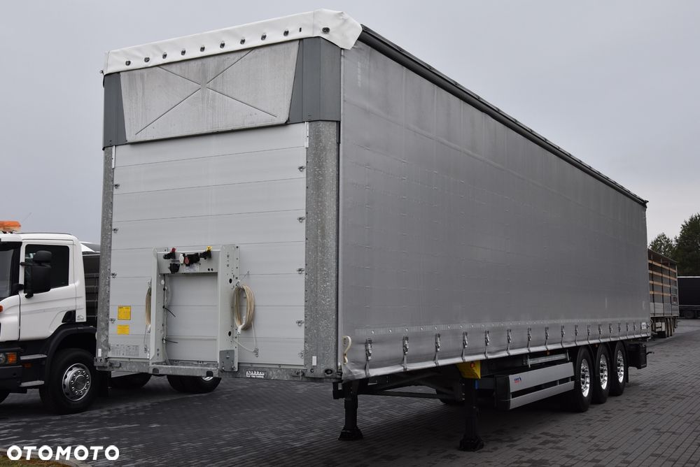 Schmitz Cargobull FIRANKA / STANDARD / COILMULDA / ALU-FELGI / DACH PODNOSZONY 21/22r REJ. / PLANDEKA WZMACNIANA OE SCHMITZ / OŚ PODNOSZONA  !!! JAK NOWA !!! - 2