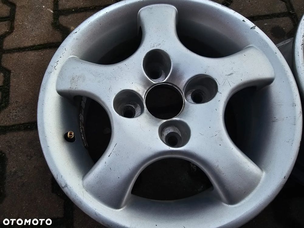 Nissan Almera 200 SX Primera / 5,5Jx13 ET32 4x114.3 - 3