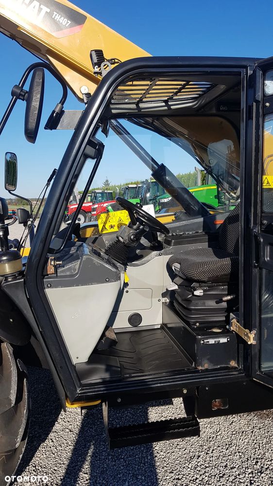 Caterpillar TH 407 - 25