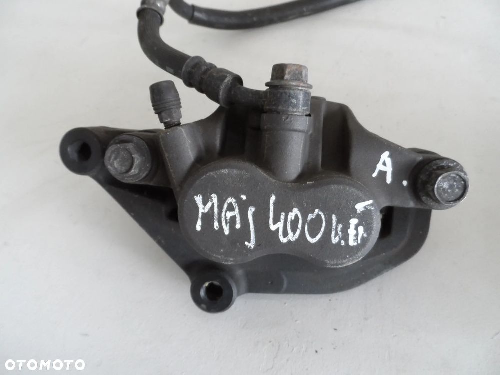 YAMAHA MAJESTY 400 zacisk hamulcowy przedni P, L - 1