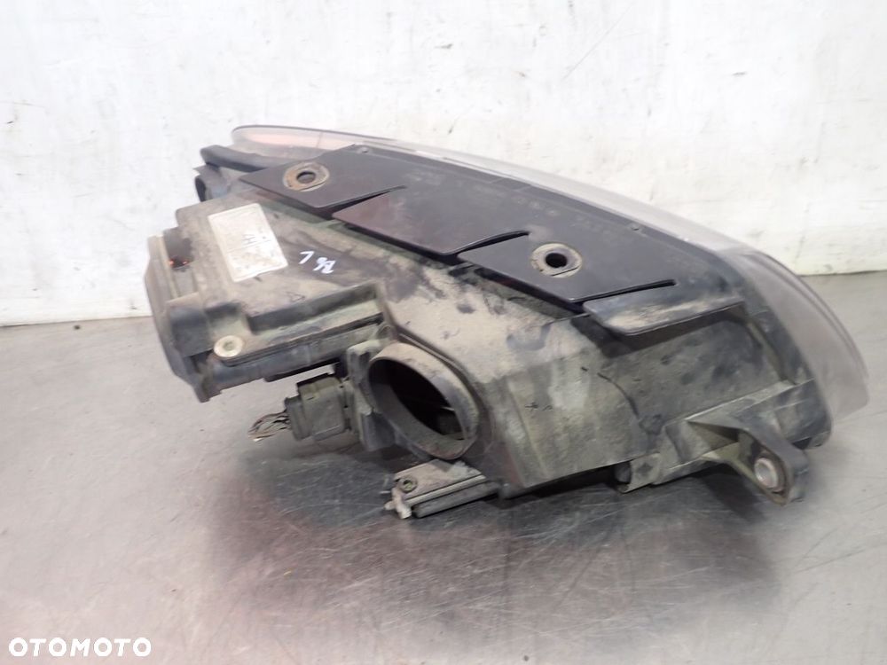 LAMPA LEWA PRZEDNIA TYC VOLKSWAGEN PASSAT B6 - 4