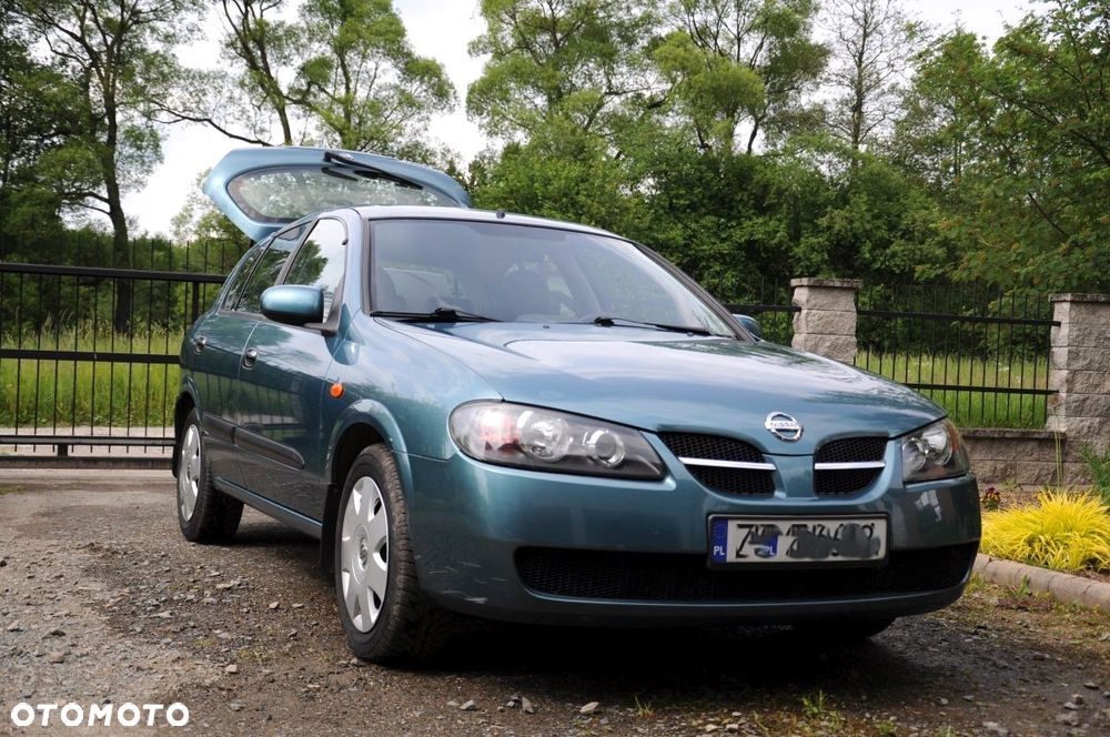 Nissan Almera 1.5 Visia + - 21