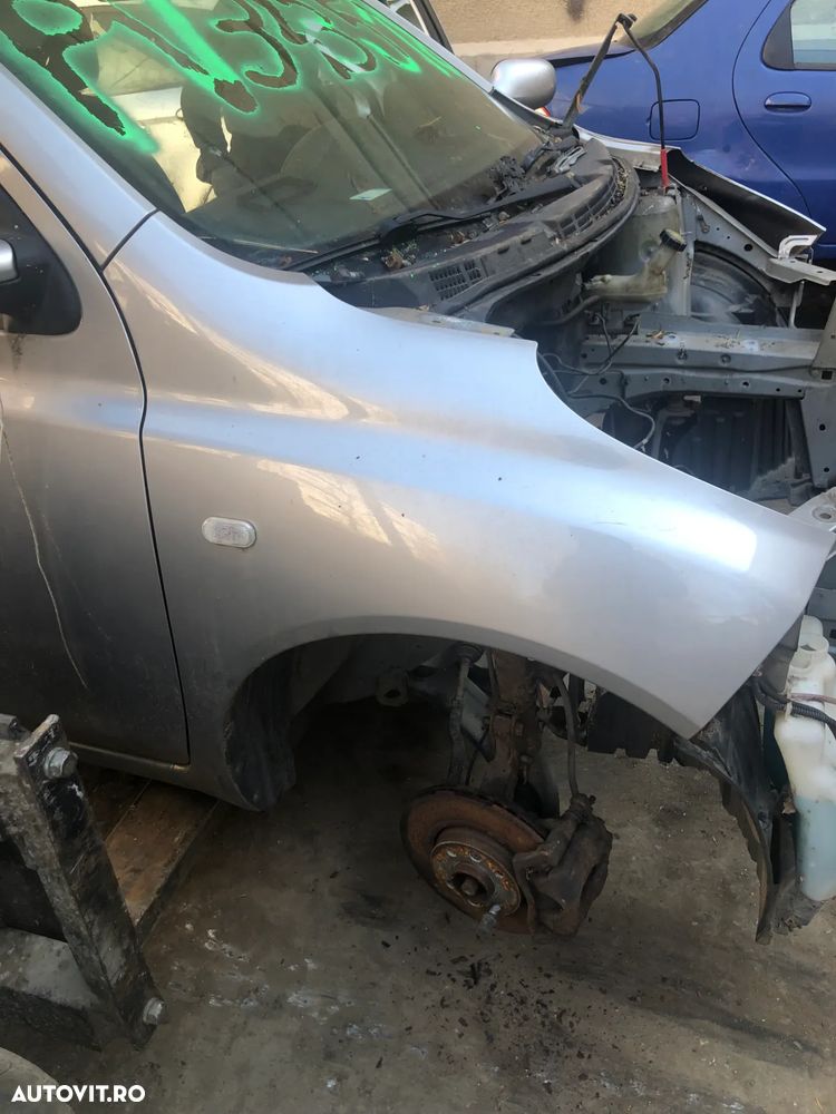 Aripa dreapta fata Nissan Micra 2005 gri argintiu - 3