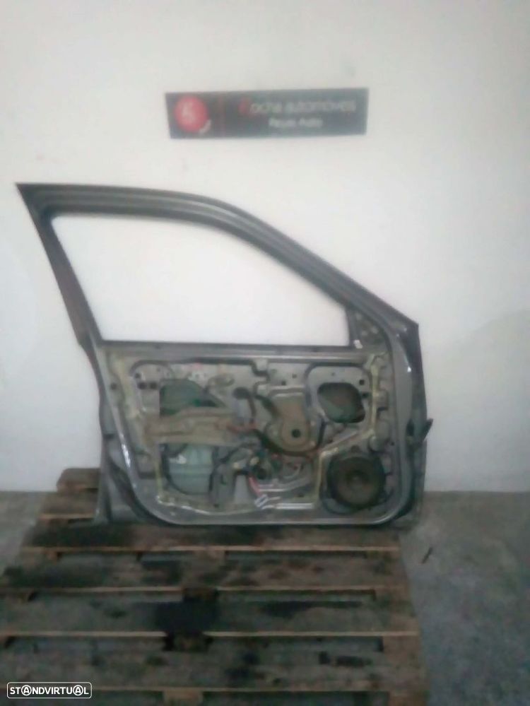 Elevador Frente Esq Nissan Primera (P11) - 2