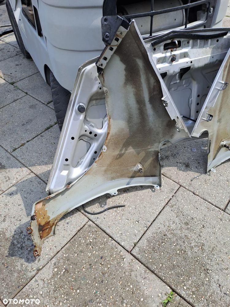 Mitsubishi Colt Z30 VI błotniki kod lakieru 21H - 28