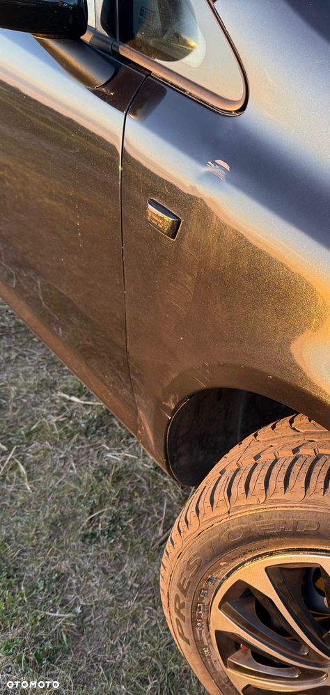 Opel Corsa 1.2 16V Cosmo - 5