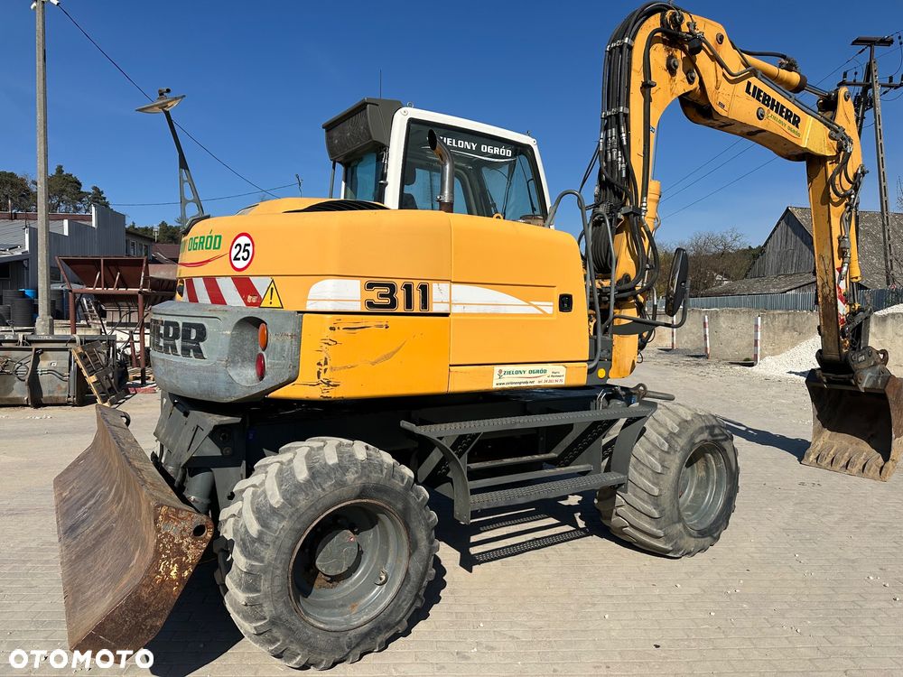 Liebherr A 311 Litronic - 2