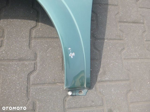 BŁOTNIK LEWY PRZÓD LEWY PRZEDNI OPEL ASTRA II G Z374 - 11