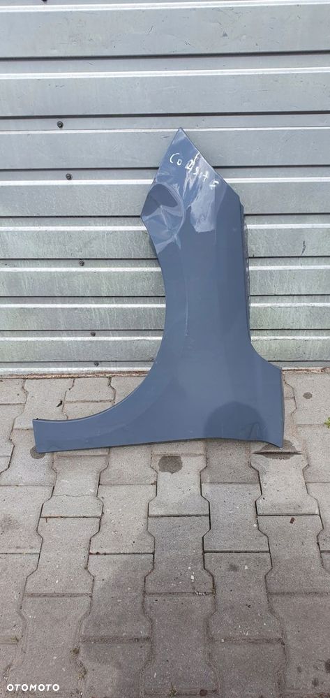 OPEL CORSA F BŁOTNIK LEWY PRZÓD PRZEDNI