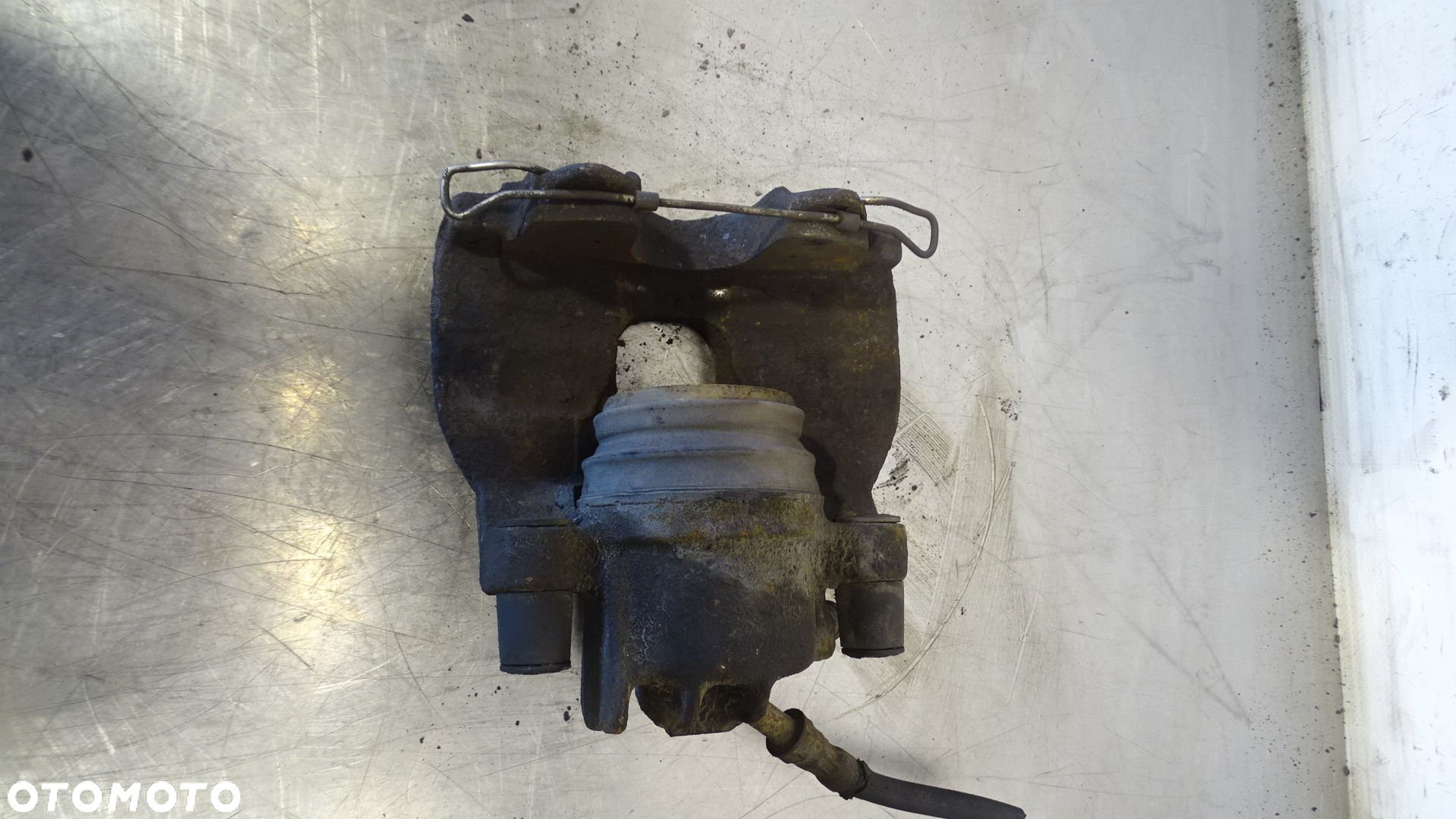 ZACISK HAMULCA LEWY PRZÓD VOLVO S60 2.4 - 7