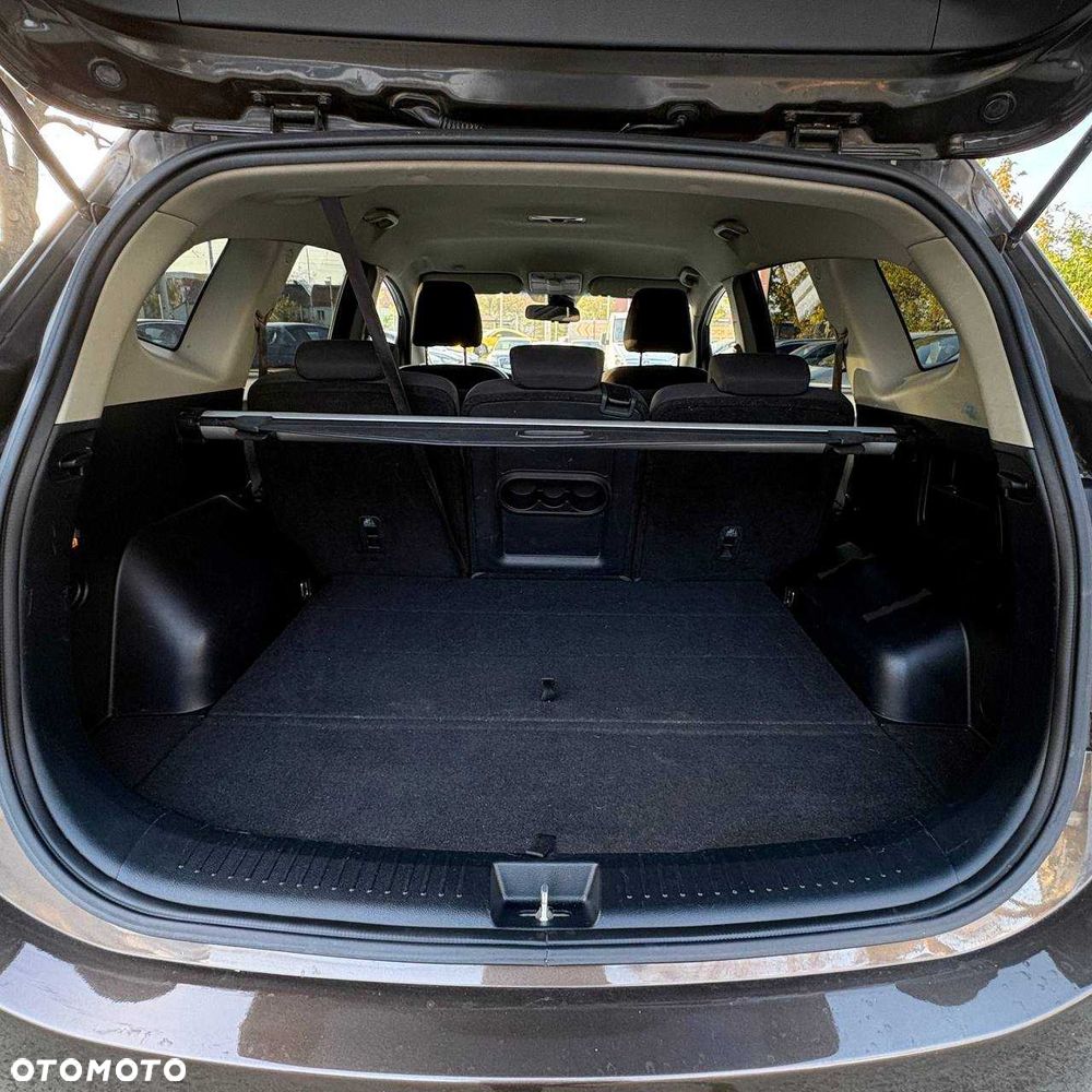 Kia Carens - 8