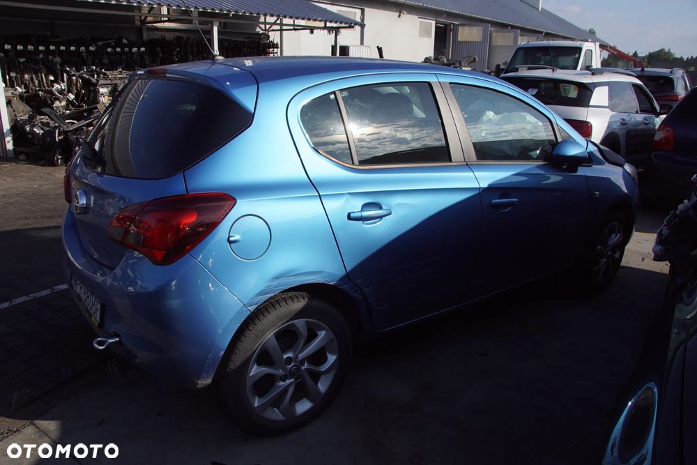 Auto na części - Opel Corsa E 1.4 Twinport 90 KM B14XEL F17 Z22V 2018R Silnik Skrzynia Drzwi Błotnik Zderzak Klapa Lampa Lusterko Klamka Szyba Deska Kokpit Sterownik Moduł Czujnik Licznik Panel Kierownica - 8