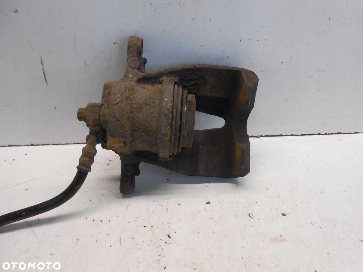 ZACISK HAMULCOWY LEWY PRZÓD OPEL CORSA C 1.3 CDTI # - 7