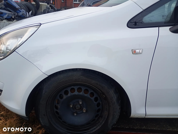 OPEL CORSA D Z474 błotnik lewy przedni lewy przód