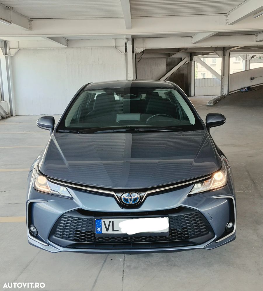 Toyota Corolla 1.8 HSD Business - 31