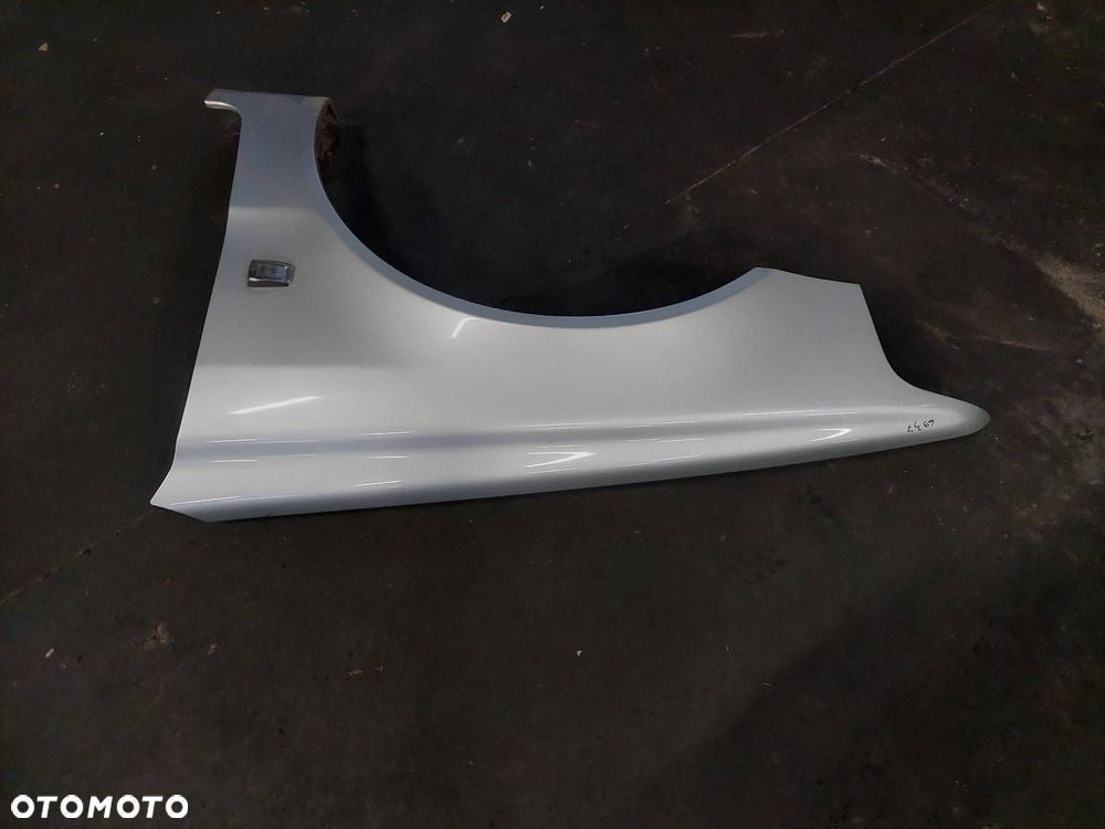 BŁOTNIK LEWY PRZÓD VOLVO V40 I S40 I LIFT 329-52 - 2