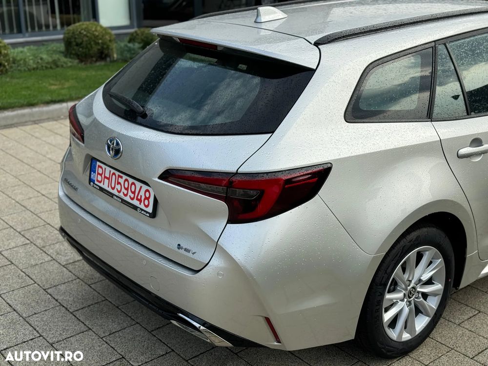 Toyota Corolla Sedan 1.8 HEV Business - 10