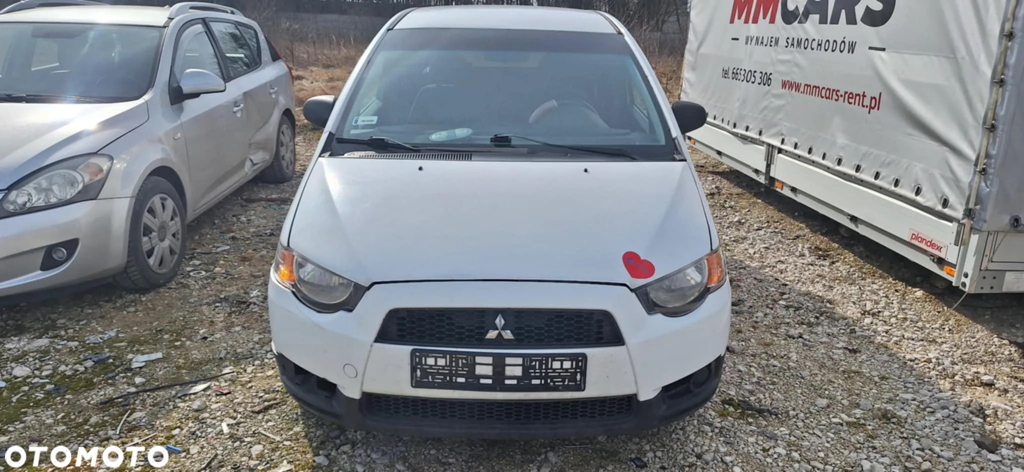 Mitsubishi COLT VI LIFT 1,1 75KM piasta zwrotnica lewy przód - 9