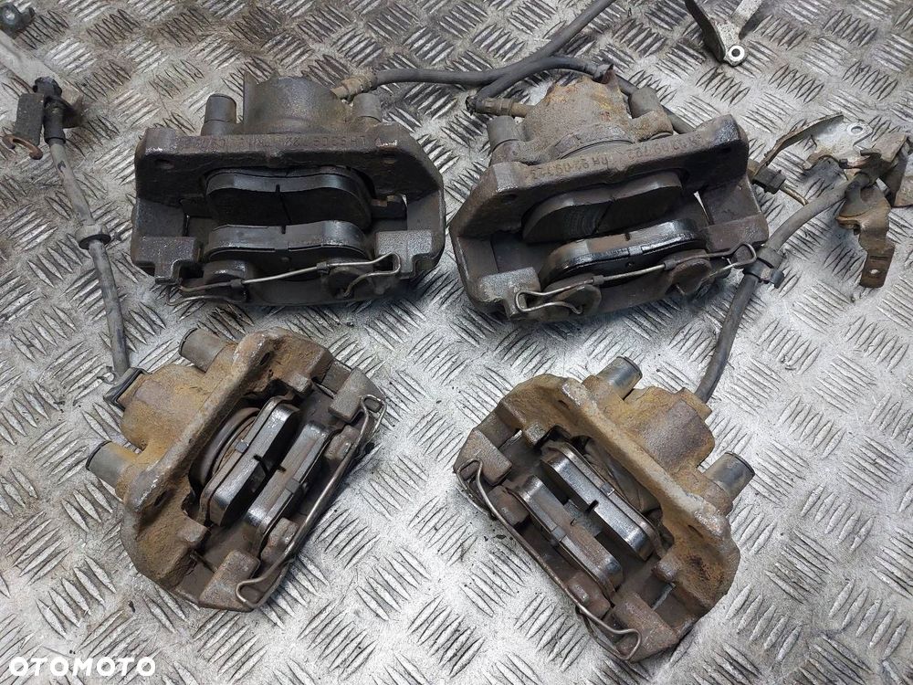 TARCZE HAMULCOWE TYŁ + PRZÓD + ZACISKI KOMPLET VOLVO S60 I 2.4 D5 - 11