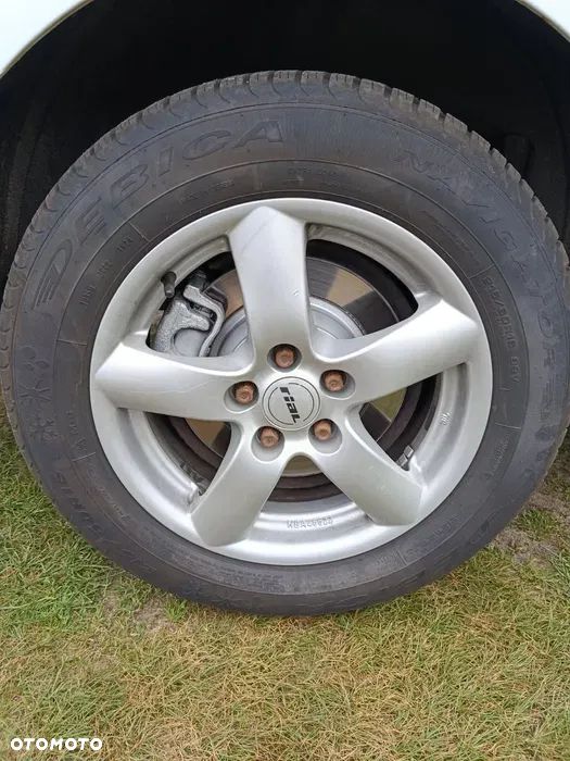 Całoroczne Dębica 215 60 16 z felgami - 2