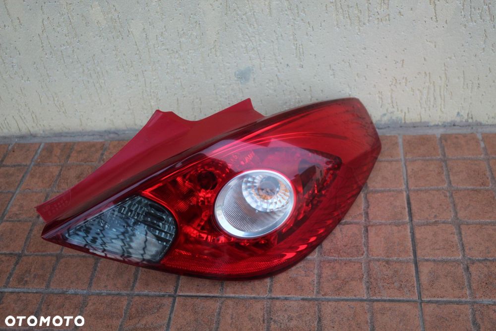 LAMPA PRAWY TYŁ OPEL CORSA D 3D 13186351