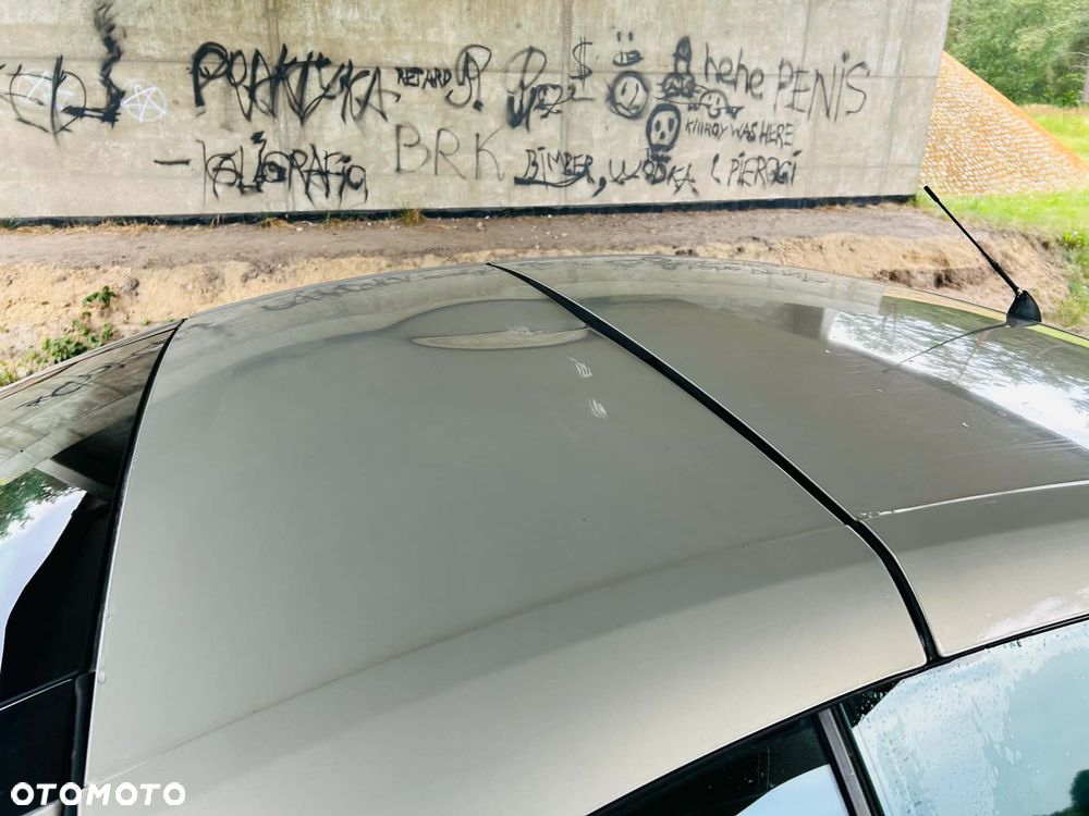 Opel Astra 1.6 Cosmo - 13