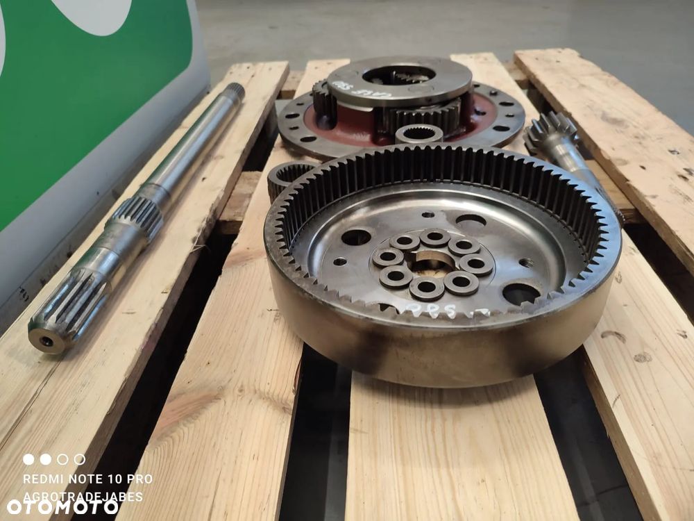 Zwolnica Case 580 SLE Carraro - 11