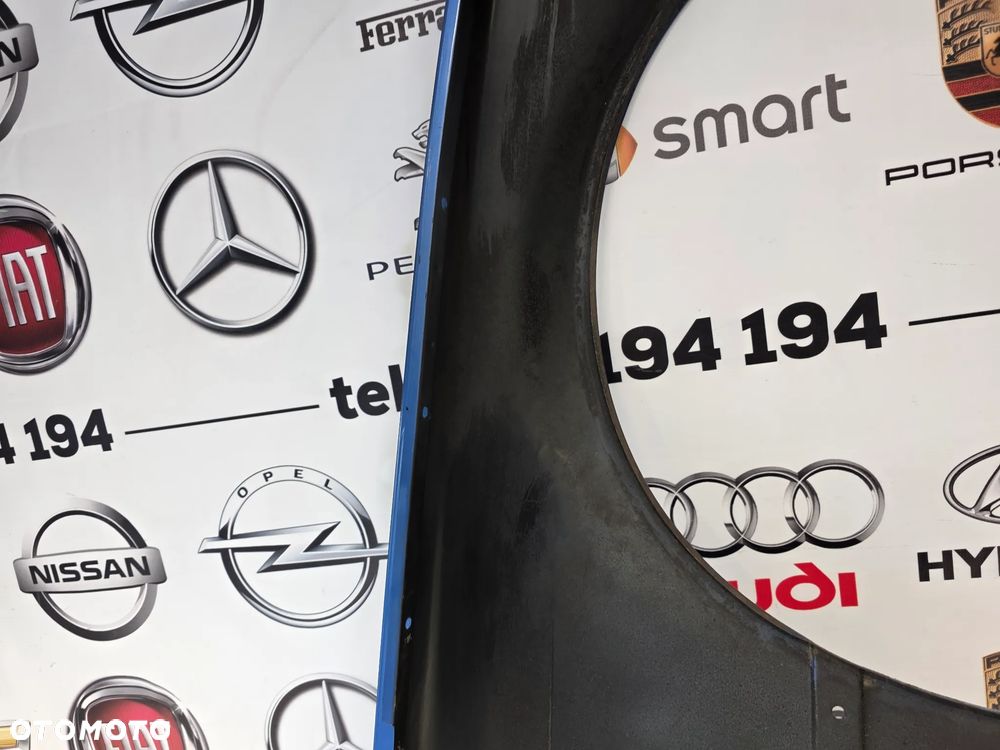 BMW E36 COUPE LEWY ŁADNY BŁOTNIK KOLOR BŁĘKITNY METALIK NR AUKCJI BŁ231 - 33