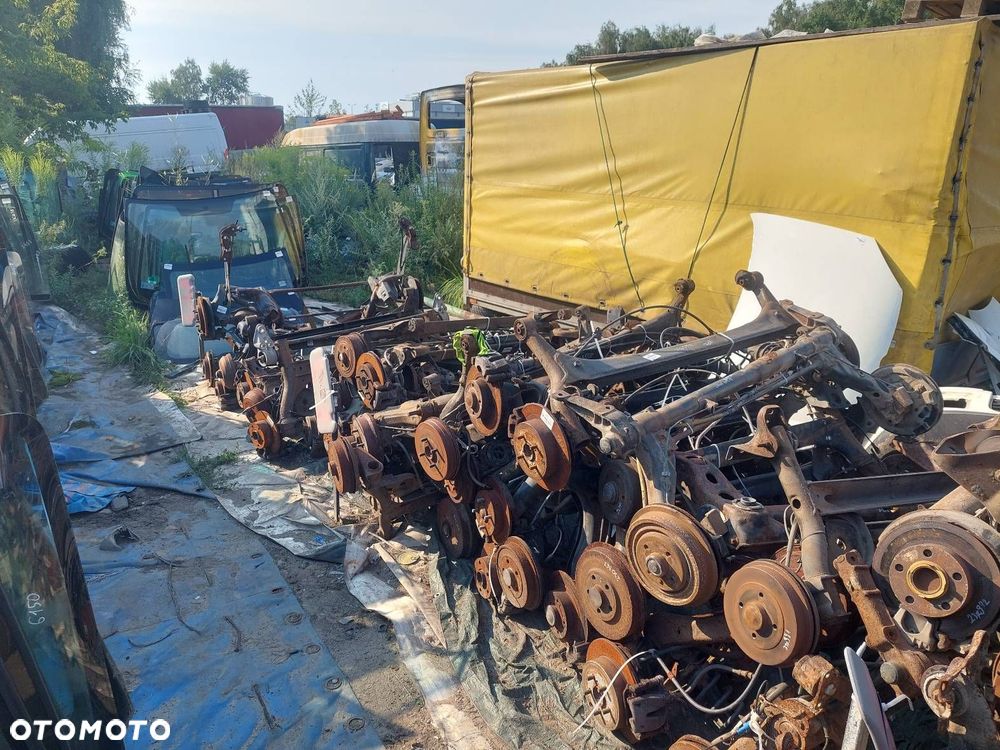 BELKA OŚ ZAWIESZENIA TYŁ BĘBNY Z ABS TOYOTA YARIS I ID: 238000 - 7
