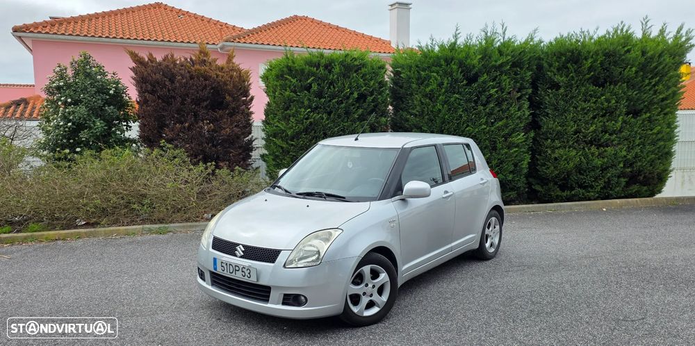 Suzuki Swift 1.3 DDiS GLX - 1