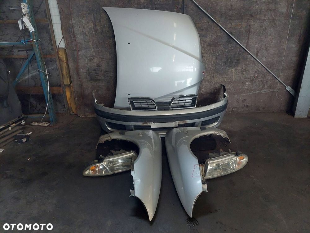 KOMPLETNY PRZÓD MITSUBISHI CARISMA I FL A50 MASKA ZDERZAK LAMPY - 1