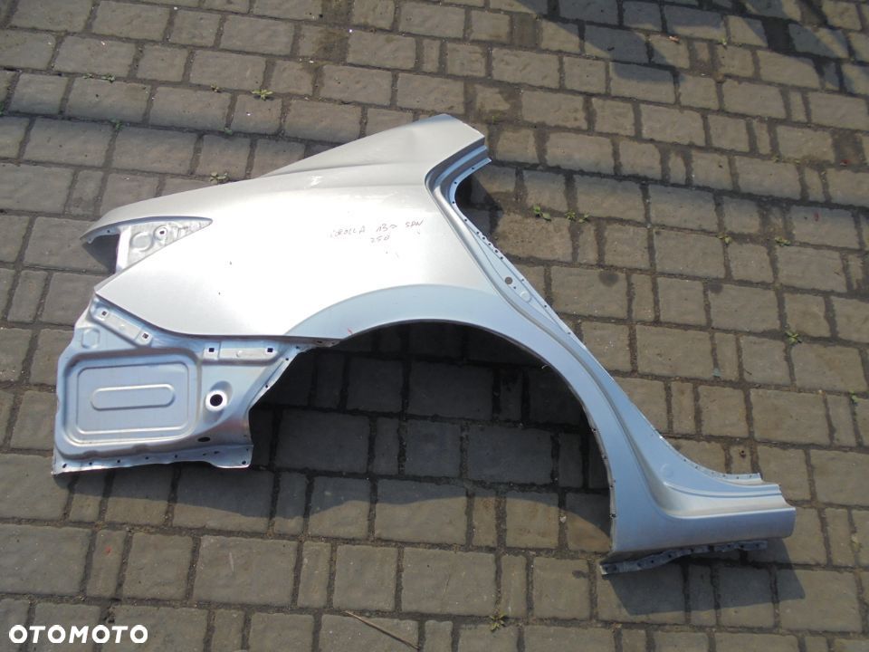 BŁOTNIK PRAWY TYLNY TOYOTA COROLLA E17 13- - 1