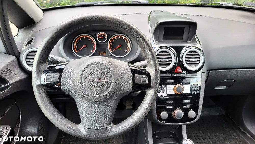 Opel Corsa 1.4 16V Enjoy - 17