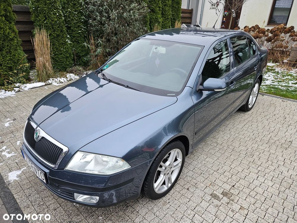Skoda Octavia 1.6 FSI Ambiente - 9