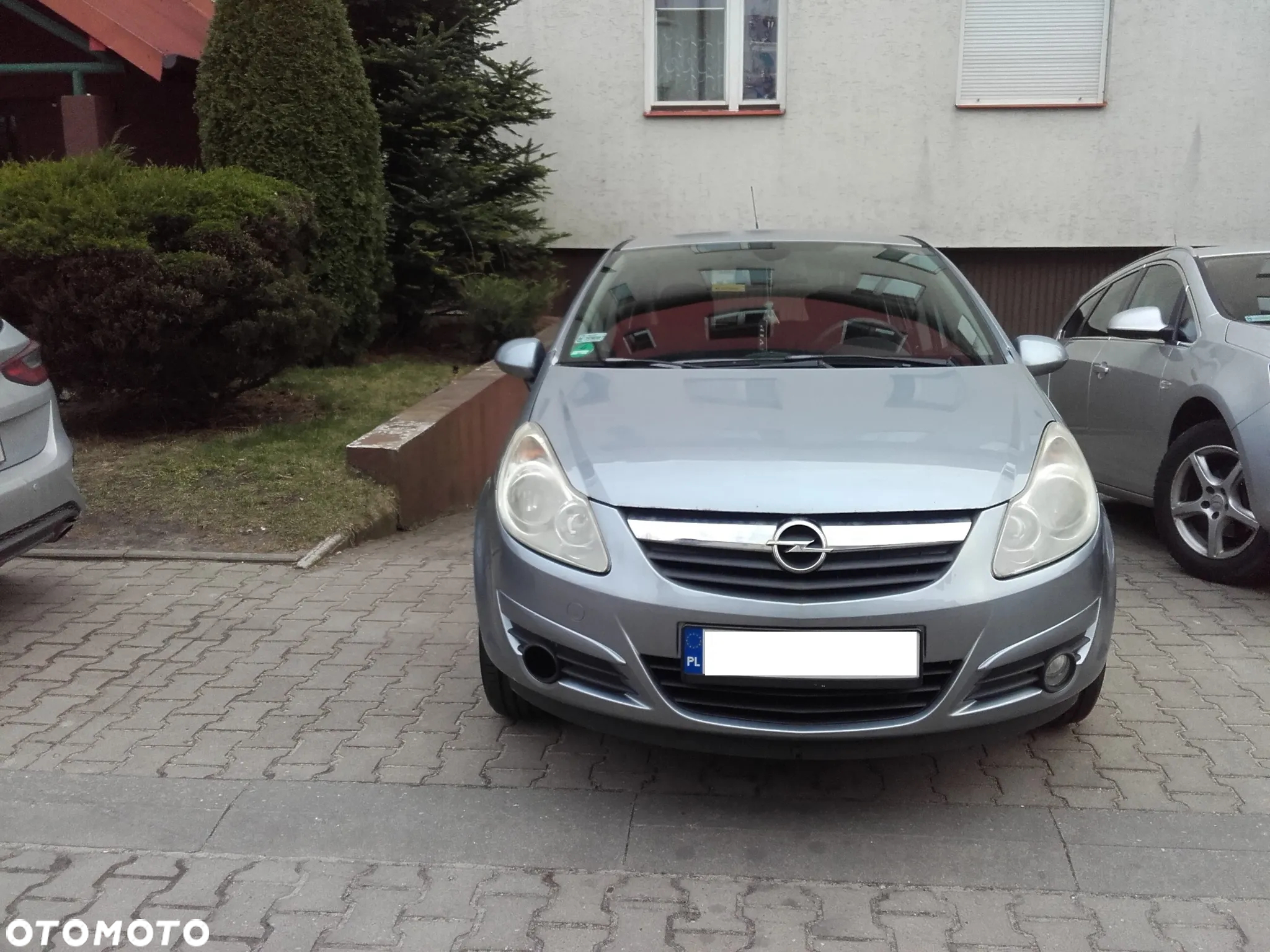 Opel Corsa 1.4 16V Cosmo - 8