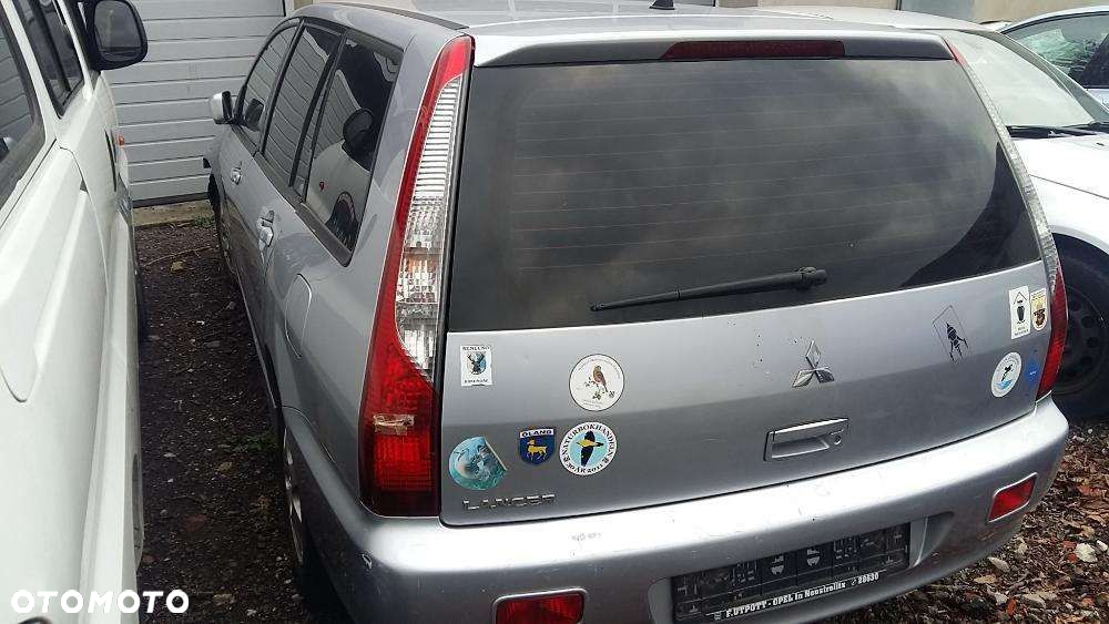 Na części Mitsubishi Lancer VII Silnik Skrzynia Maska Zderzak Drzwi Klapa Szyba - 2