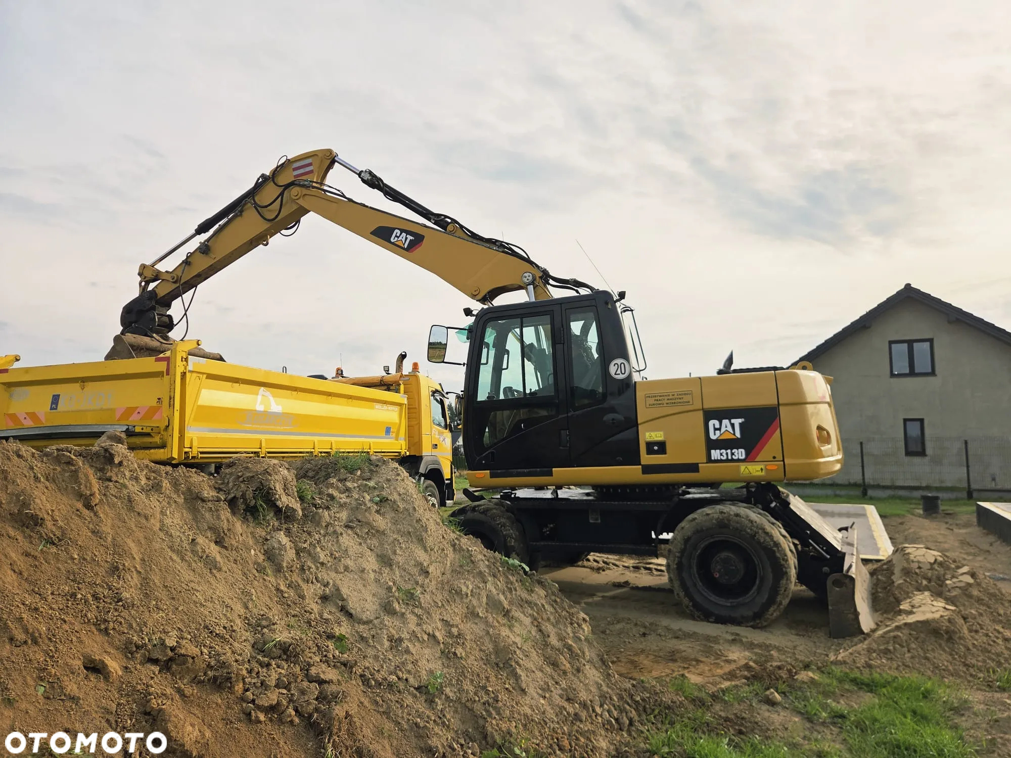 Caterpillar M313D - 11