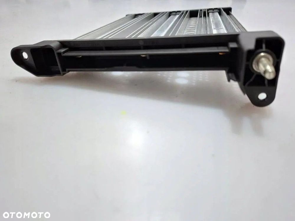 Volkswagen Golf VII Nagrzewnica elektryczna grzałka 5Q0963235B oryginał - 7