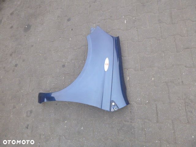 BŁOTNIK LEWY PRZÓD LEWY PRZEDNI TOYOTA YARIS I LIFT 03-05 - 13