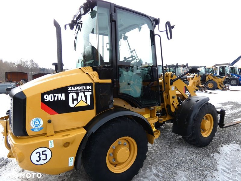 Caterpillar CAT 907M Z Niemiec / Wyjątkowo Wyposażony / 35km/h / 3.050mtg / - 33