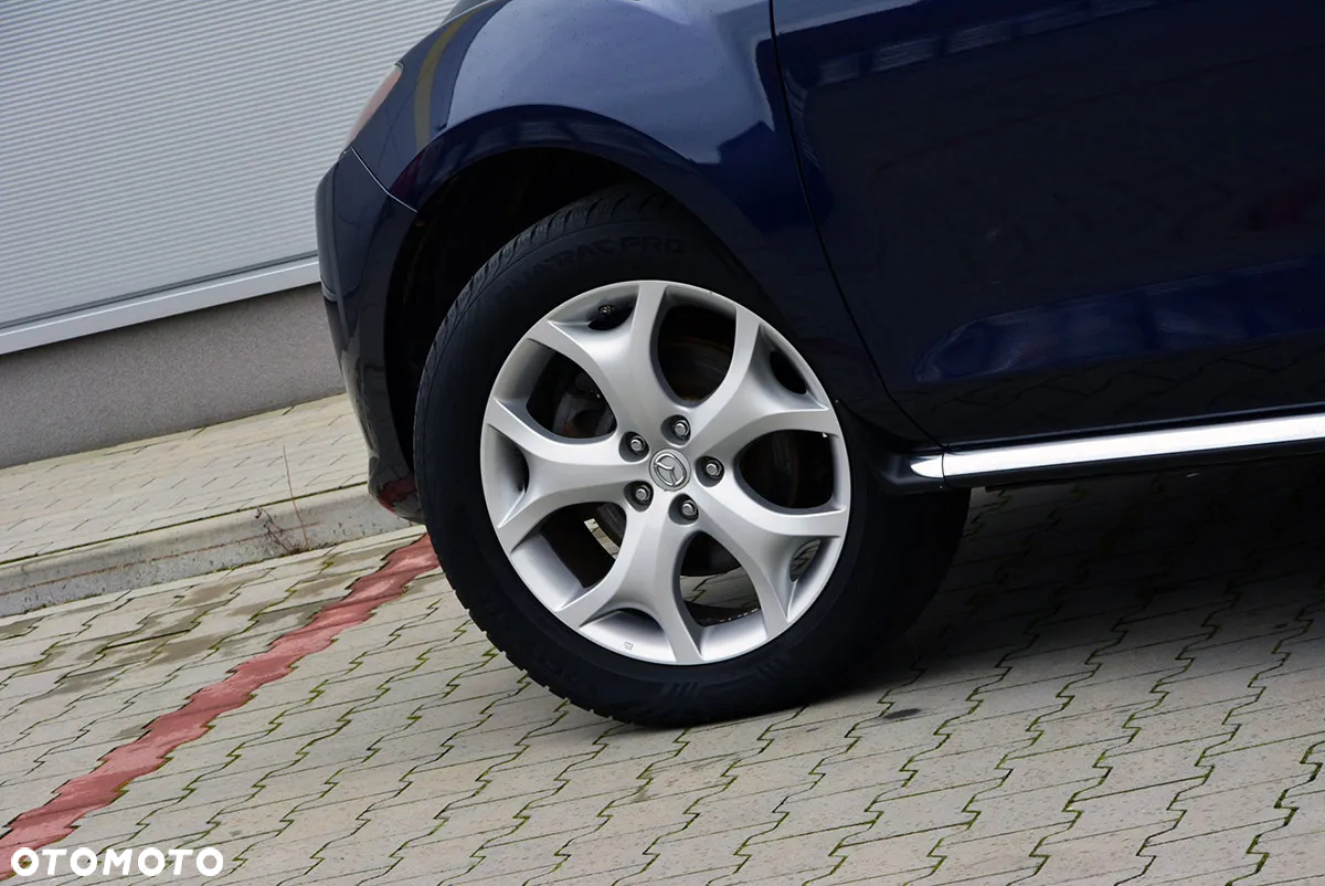 Mazda CX-7 2.2 CD Exclusive + - 12