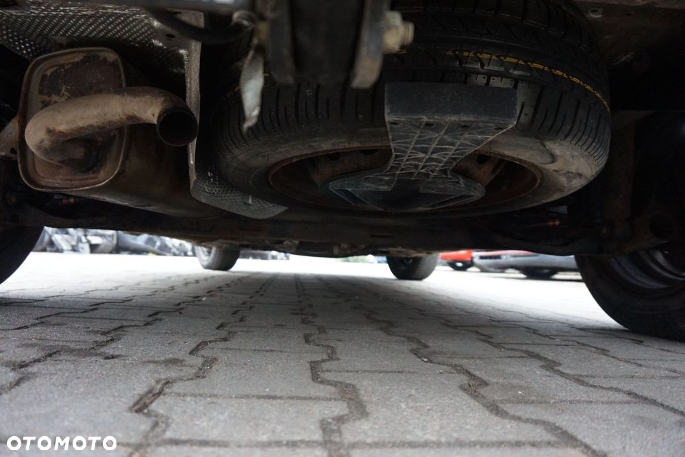 WINDA MOCOWANIE KOŁA ZAPASOWEGO CLIO III PH1 KOMBI 7701209284 8200667569 RENAULT 2005-2009 - 1