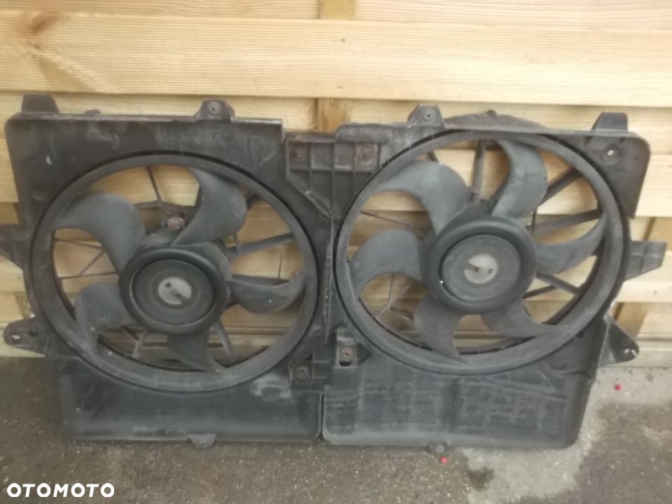 MAZDA TRIBUTE 2,3 150KM WENTYLATORY CHLODNICY komplet oryginal - 4