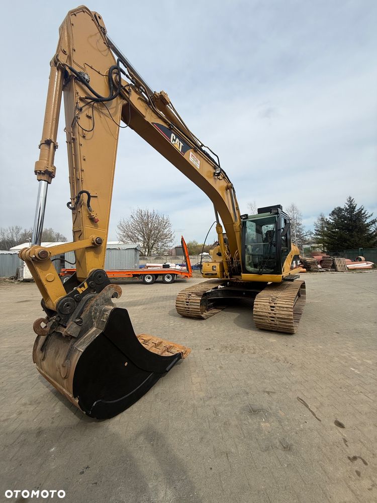 Caterpillar 318C - 16