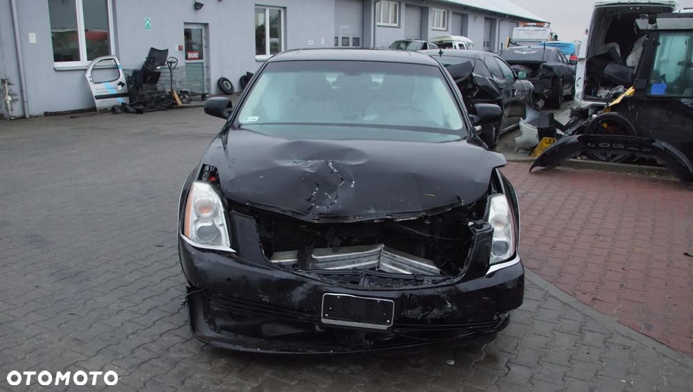 Auto na części - Cadillac DTS 4.6 V8 295 KM LD8 2008R Silnik Skrzynia Drzwi Zderzak Błotnik Lampa Lusterko Szyba Klapa Deska Kokpit Sterownik Moduł Czujnik Licznik Wyświetlacz Kierownica Panel - 2