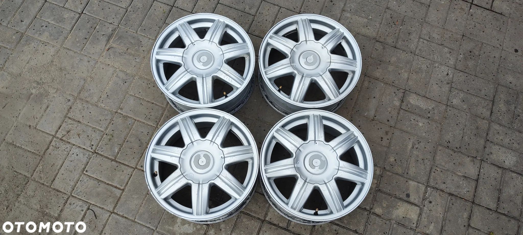 FELGI ALUMINIOWE 6L0601025B 5x100 6.5Jx16 CALI ET43 SEAT VW AUDI SKODA KOMPLET 4 SZTUKI - 1