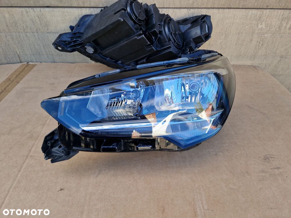 OPEL CORSA F LAMPA REFLEKTOR PRAWA LEWA PRZÓD PRZEDNIA 39162649 - 8